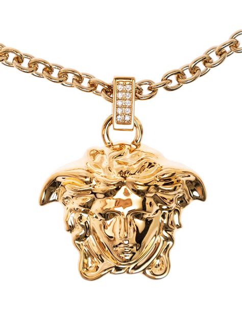 ciondolo versace oro prezzo|1.